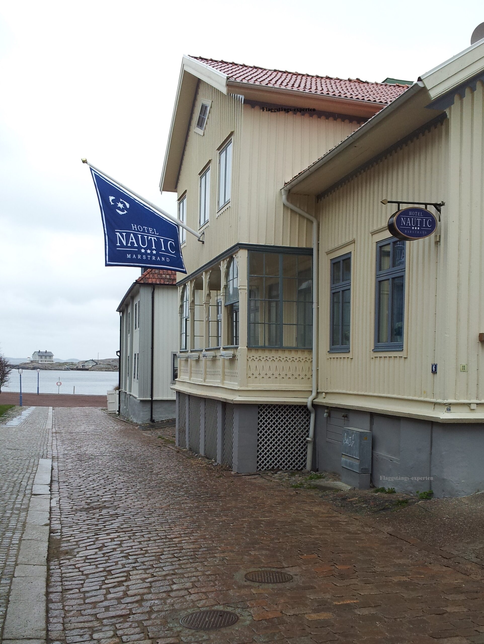 Montering av fasadflaggstång - Bild 3